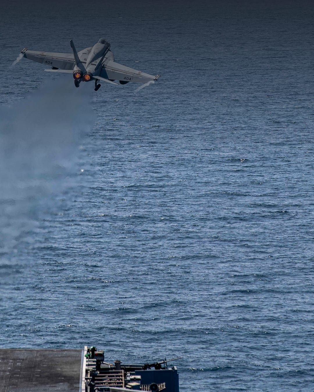 U.S. Navy F/A-18E Super Hornet launches from an aircraft carrier